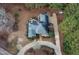 A comprehensive aerial view showcasing the property's layout, landscaping, and private setting nestled amongst mature trees at 725 Thompson Rd, Garner, NC 27529