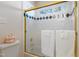 Clean bathroom featuring shower and tub with framed glass doors at 725 Thompson Rd, Garner, NC 27529