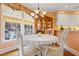 Cozy dining area with an elegant chandelier and plenty of natural light at 725 Thompson Rd, Garner, NC 27529
