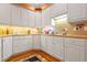 Functional kitchen space with generous countertop space and white cabinetry at 725 Thompson Rd, Garner, NC 27529