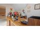 Bright home office with large wooden desk and lots of shelving at 725 Thompson Rd, Garner, NC 27529