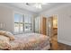Cozy bedroom with hardwood floors, plantation shutters, ceiling fan and bathroom access, providing a relaxing retreat at 7250 Hwy 751 # 2109, Durham, NC 27707