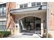 Modern building entrance featuring glass doors and visible staircase at 7250 Hwy 751 # 2109, Durham, NC 27707