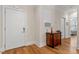 Cozy entryway with hardwood floors and hallway leading to a bedroom at 7250 Hwy 751 # 2109, Durham, NC 27707