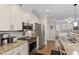 Modern kitchen with stainless steel appliances, granite counters, and ample cabinet space at 7250 Hwy 751 # 2109, Durham, NC 27707