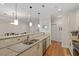 Well-equipped kitchen featuring stainless steel appliances, granite countertops, and pendant lighting at 7250 Hwy 751 # 2109, Durham, NC 27707