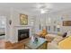 Inviting living room features a fireplace, large windows with shutters, and comfortable seating at 7250 Hwy 751 # 2109, Durham, NC 27707