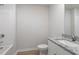 Stylish bathroom featuring a granite countertop vanity and modern fixtures at 809 Rhino Bnd, Oxford, NC 27565