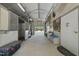 Clean barn interior featuring stalls, storage, and ample workspace, perfect for equestrian activities at 8809 Farrington Mill Rd, Chapel Hill, NC 27517