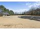 Well-maintained horse training ring with letters, buildings and beautiful surroundings at 8809 Farrington Mill Rd, Chapel Hill, NC 27517