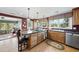 Spacious kitchen with stainless steel appliances and a central island at 8809 Farrington Mill Rd, Chapel Hill, NC 27517