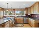 Well-equipped kitchen with modern appliances and ample counter space at 8809 Farrington Mill Rd, Chapel Hill, NC 27517