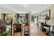 Bright and airy living room featuring large windows and elegant furnishings at 8809 Farrington Mill Rd, Chapel Hill, NC 27517