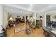Spacious living room with hardwood floors and a fireplace offers a cozy and inviting atmosphere at 8809 Farrington Mill Rd, Chapel Hill, NC 27517