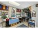 Functional tack room with blue accents, storage, and display areas, creating a tidy equestrian space at 8809 Farrington Mill Rd, Chapel Hill, NC 27517
