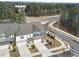 Aerial view of newly constructed homes with modern design and manicured landscaping at 1000 Pyrenees Way, Cary, NC 27519