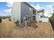 Large backyard with a privacy fence, a screened in porch, and plenty of space to relax and play at 1000 Pyrenees Way, Cary, NC 27519