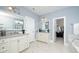 This bathroom features a double vanity, a walk-in closet, and a separate toilet room at 1000 Pyrenees Way, Cary, NC 27519
