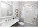 Bright bathroom with white tile, modern fixtures, and stylish decor creating a serene and clean space at 1000 Pyrenees Way, Cary, NC 27519