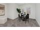 Bright dining area with a table and chairs and a plant at 104 Deep Gap Run, Cary, NC 27519
