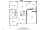 Detailed first floor plan showing the layout of the primary bedroom, living room, kitchen, and garage at 104 Deep Gap Run, Cary, NC 27519