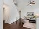 Bright open living room with high ceilings, hardwood floors, and neutral paint scheme at 104 Deep Gap Run, Cary, NC 27519