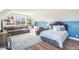 Cozy bedroom with a comfortable seating area, with plenty of light provided by the large window at 107 Crescent Hill Ln, Rougemont, NC 27572