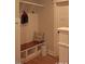Mudroom with a built-in bench and hooks, providing a convenient spot to organize shoes and coats at 107 Crescent Hill Ln, Rougemont, NC 27572
