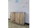 Exterior view of the fence covering up the utilities on the side of the home at 1077 Kafka Dr, Fuquay Varina, NC 27526