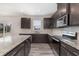 Beautiful kitchen with granite countertops, stainless steel appliances and an island at 1077 Kafka Dr, Fuquay Varina, NC 27526