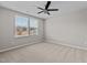 Spacious bedroom featuring neutral carpet, a ceiling fan, and natural light, offering a comfortable and inviting atmosphere at 1122 Briar Rose Ln, Durham, NC 27704