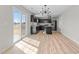 Kitchen features black cabinets, stainless steel appliances, and granite countertops at 1122 Briar Rose Ln, Durham, NC 27704