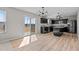 Kitchen features black cabinets, granite countertops, and stainless steel appliances at 1122 Briar Rose Ln, Durham, NC 27704