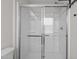 Clean glass enclosed shower with tile walls at 1122 Briar Rose Ln, Durham, NC 27704