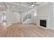 Spacious living room features a fireplace, large windows, and modern finishes at 124 Hemlock Falls Trl # 189, Raleigh, NC 27603