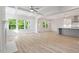 Open concept floor plan showcasing the kitchen and large living room at 124 Hemlock Falls Trl # 189, Raleigh, NC 27603