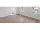 Office featuring stylish wood-look flooring, neutral walls, and natural light, perfect for a productive workspace at 124 Hemlock Falls Trl # 189, Raleigh, NC 27603