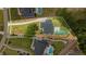 An aerial view of a private residence with a pool and extensive landscaping at 132 Edward Booth Ln, Durham, NC 27713