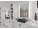 Elegant bathroom featuring double vanities, modern fixtures, and ample counter space at 132 Edward Booth Ln, Durham, NC 27713