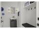 Chic bathroom with stylish vanity, mosaic mirror, and convenient storage for a tidy and functional space at 132 Edward Booth Ln, Durham, NC 27713