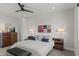 Relaxing bedroom featuring a plush bed, elegant lighting, and chic furnishings for ultimate comfort at 132 Edward Booth Ln, Durham, NC 27713
