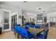 Features a large dining table, contemporary lighting, and open access to the living room, perfect for gatherings at 132 Edward Booth Ln, Durham, NC 27713