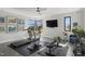 Bright home gym featuring exercise equipment, large windows, and ample space for workouts at 132 Edward Booth Ln, Durham, NC 27713