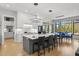 Modern kitchen with a large island, sleek countertops, and stainless-steel appliances perfect for cooking at 132 Edward Booth Ln, Durham, NC 27713