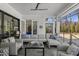 Comfortable outdoor patio featuring a large sectional, chic accents, and a peaceful ambiance for relaxation at 132 Edward Booth Ln, Durham, NC 27713