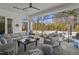 Stylish outdoor patio with cozy seating, elegant decor, and a serene view of the landscaped surroundings at 132 Edward Booth Ln, Durham, NC 27713