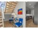Modern staircase with stylish accent decor, adjacent to the entry and kitchen at 132 Edward Booth Ln, Durham, NC 27713