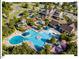 A picturesque aerial view of the community clubhouse and recreational pool at 153 Abercorn Cir, Chapel Hill, NC 27516