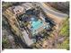 Community pool with lounge areas and manicured landscaping at 153 Abercorn Cir, Chapel Hill, NC 27516