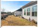 Large backyard with lawn and shrubbery at 153 Abercorn Cir, Chapel Hill, NC 27516